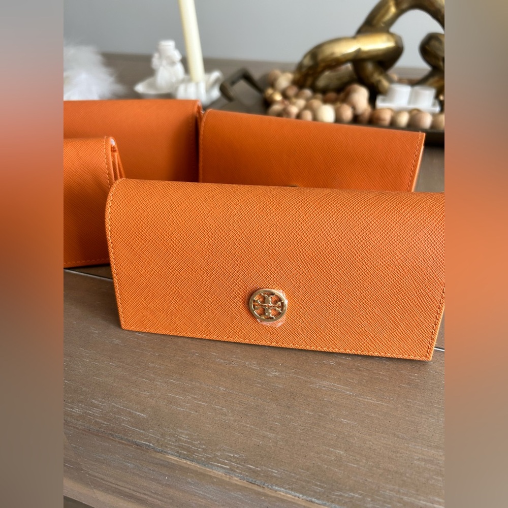 Tory Burch sunglasses case. All 4 included